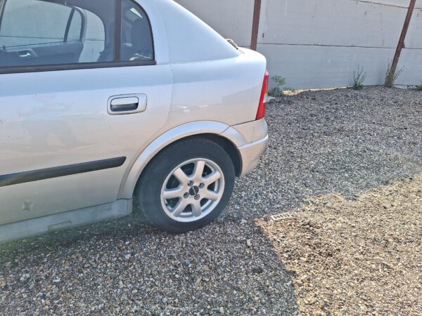 mangueta_trasera_izquierda_opel_astra_g_sedan_t98_1_6_16v_f69
