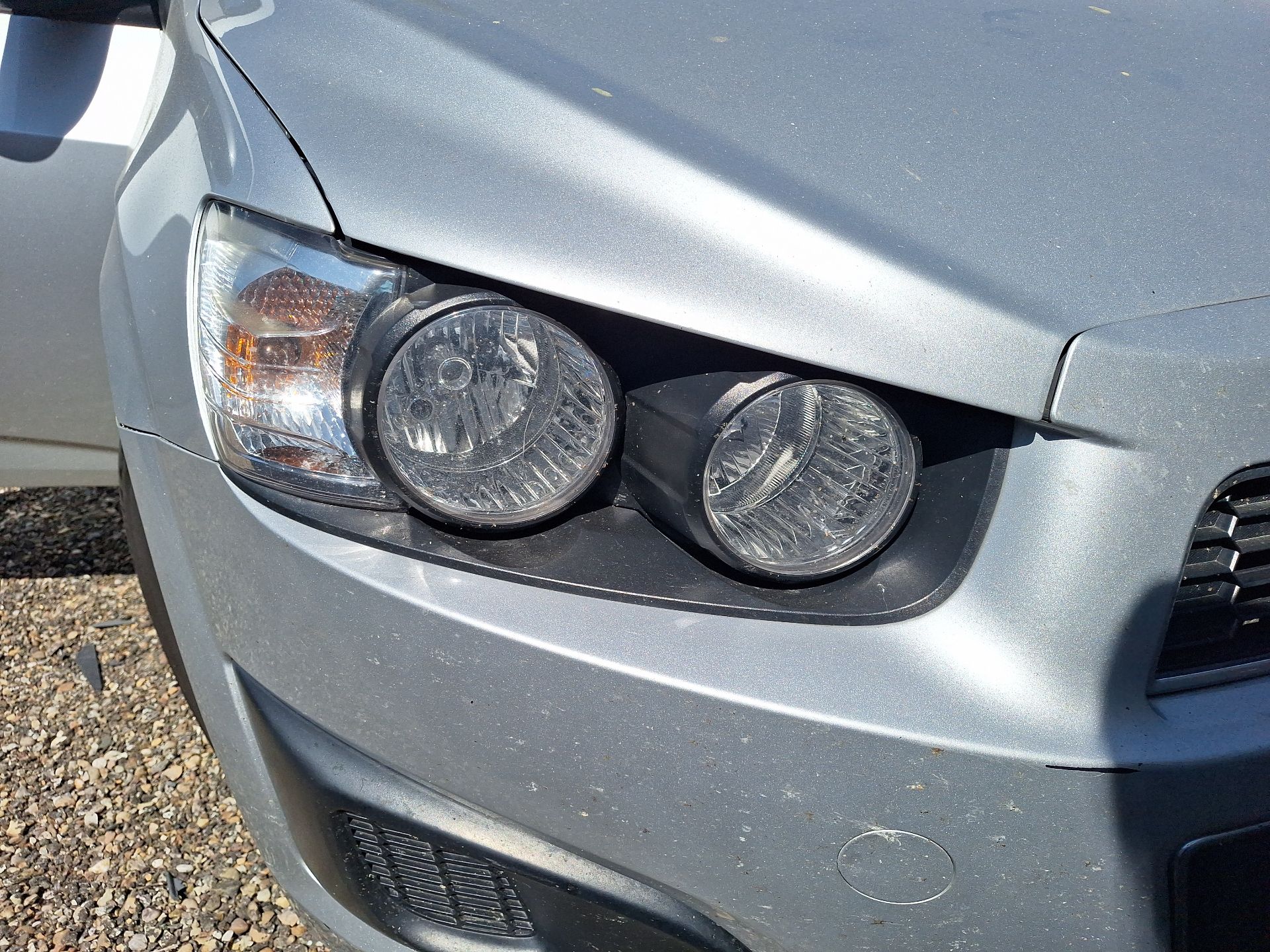 faro_derecho_chevrolet_aveo_fastback_t300_1_3_d