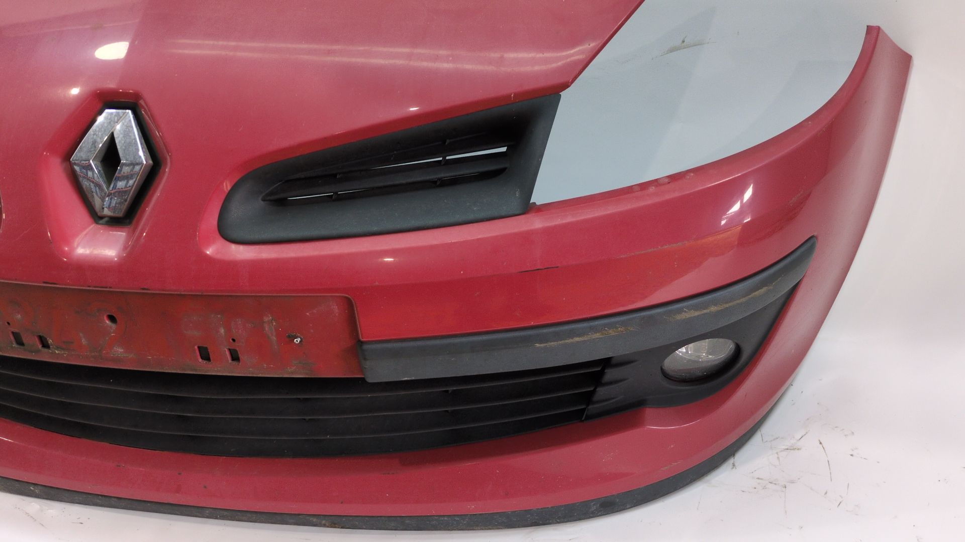 paragolpes_delantero_7701208681_color_carroceria_ov727_red_brisk_bc_renault_clio_iii_br0_1_cr0_1_1_4_16v