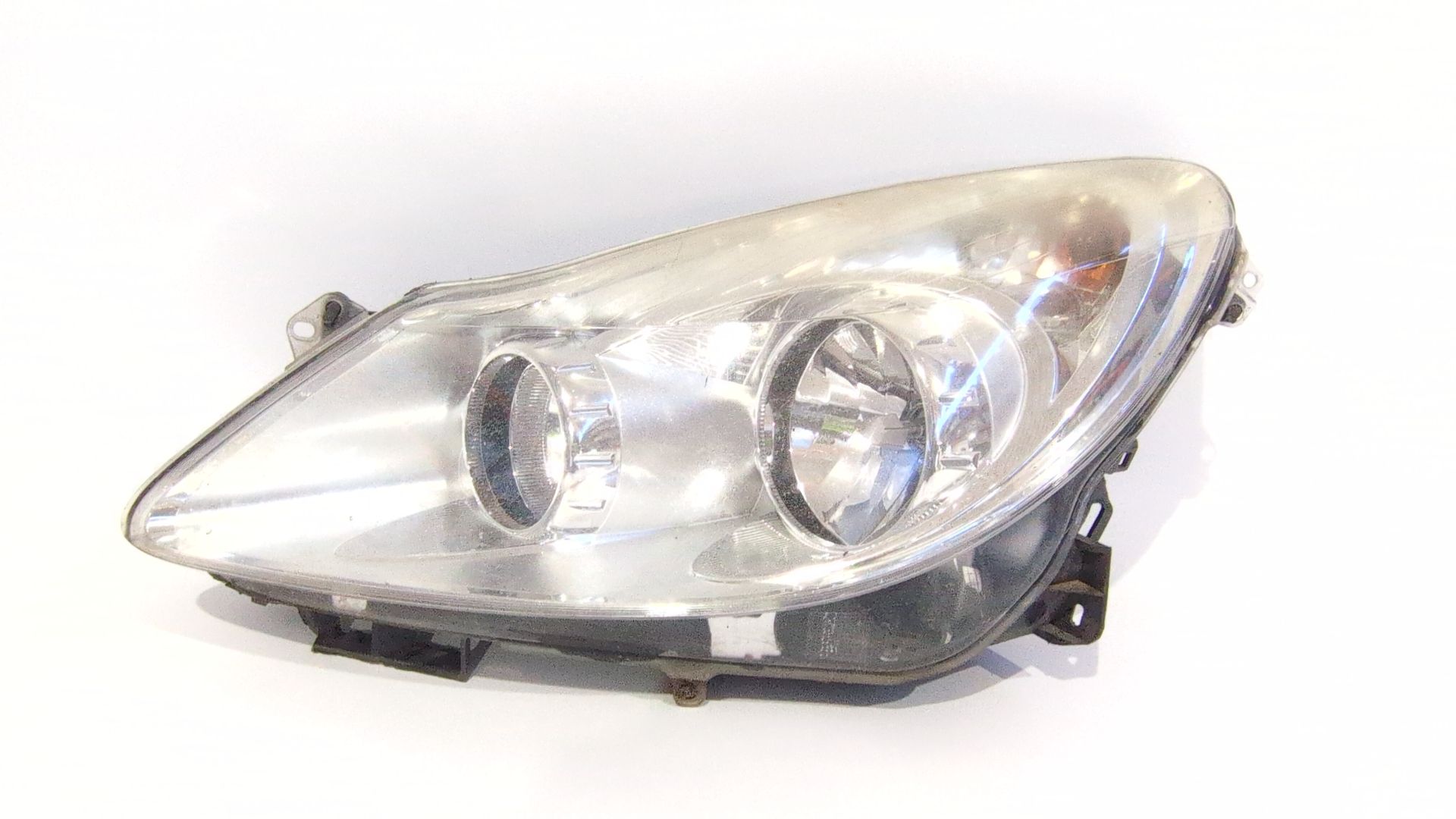 faro_izquierdo_13186381_93189358_opel_corsa_d_s07_1_3_cdti_l08_l68